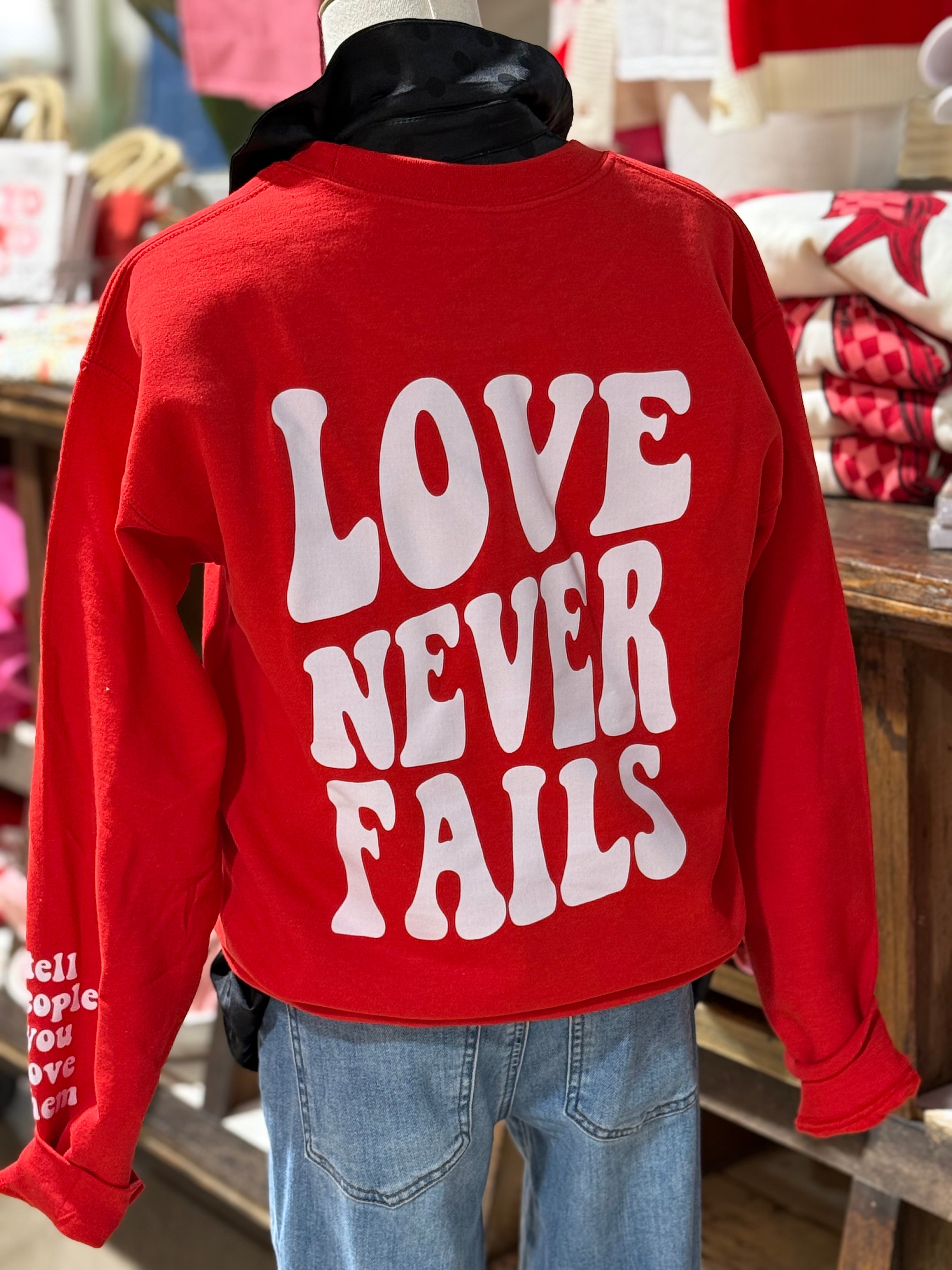 Love Never Fails Sweatshirt